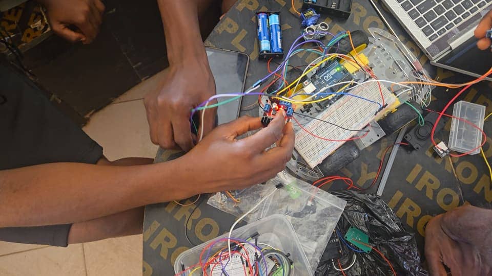 Elvon fully disassembled on the table, every part laid out before the rebuild